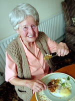 MEAL1SW_tcm9-7957 Elderly woman eating dinner