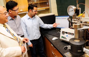 Arvind Varma Purdue Chemical Engineer Arvind Varma, Purdue Chemical Engineer, reviews data for new process.